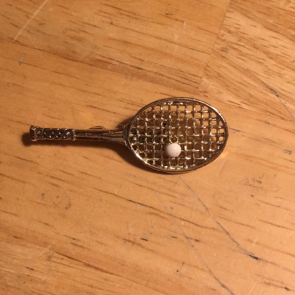 Golden tennis racket pin. Vintage